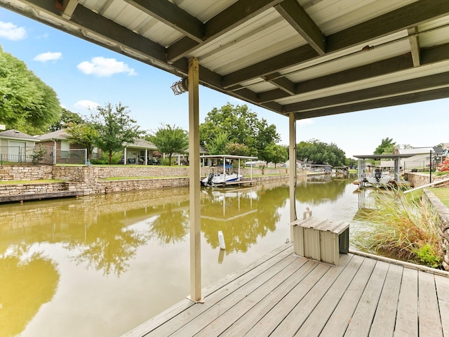 dock area with a water view