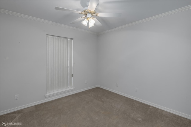 carpeted spare room featuring crown molding and ceiling fan