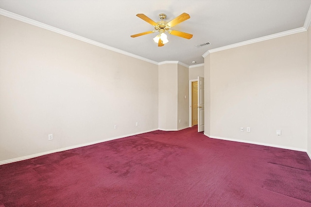 carpeted spare room featuring ornamental molding and ceiling fan