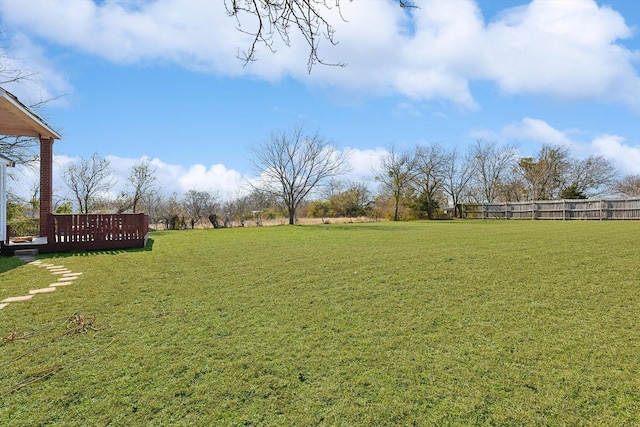 view of yard with a deck