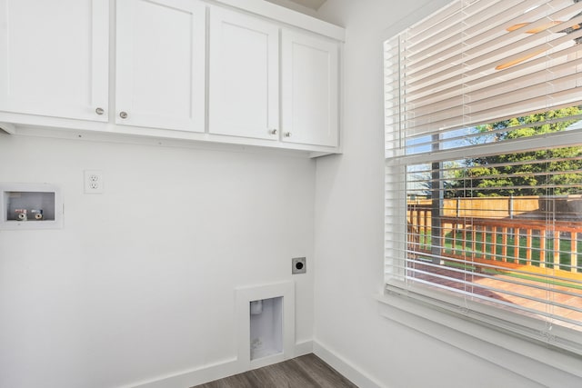 laundry room with cabinets, hookup for a washing machine, dark wood-type flooring, and hookup for an electric dryer