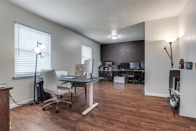 office area featuring dark wood-type flooring