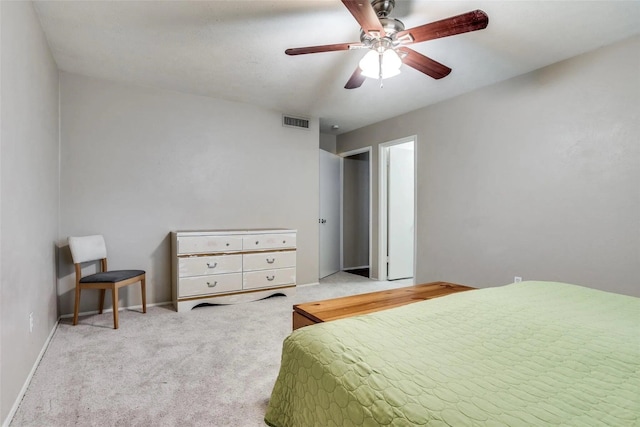 bedroom with light colored carpet and ceiling fan