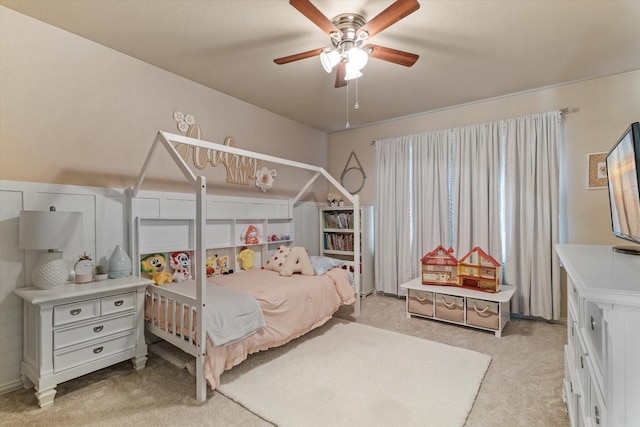 bedroom with light colored carpet and ceiling fan