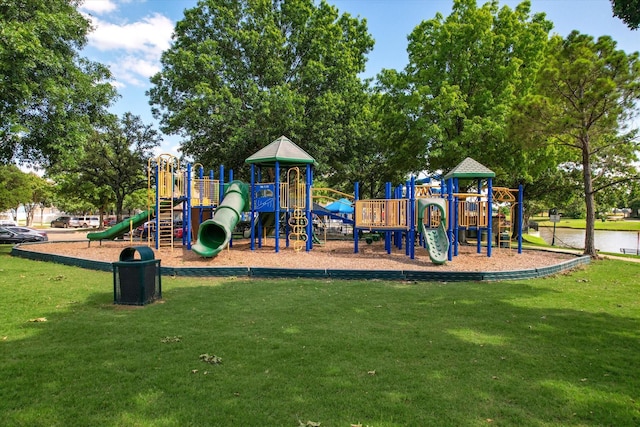 view of playground featuring a lawn