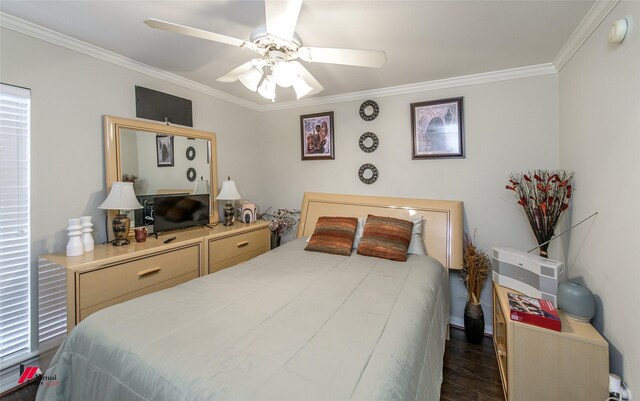 bedroom with dark wood-type flooring, ceiling fan, and crown molding