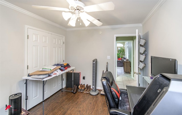 office featuring ceiling fan, ornamental molding, and dark hardwood / wood-style floors