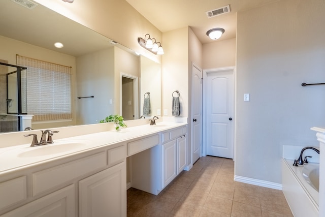 bathroom with vanity, tile patterned floors, and shower with separate bathtub