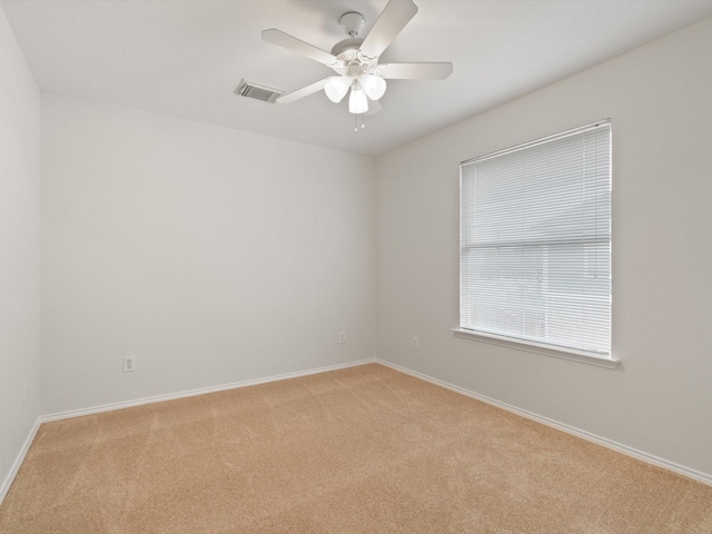 2425 Brycewood Ln, Plano, TX 75025 - spare room with light carpet, ceiling fan, and baseboards