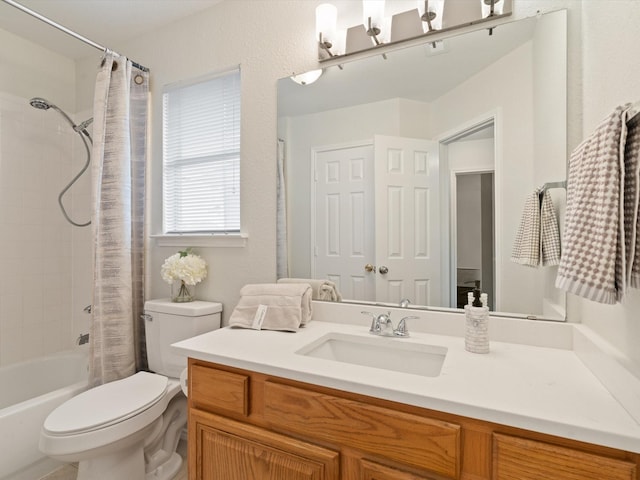 full bathroom featuring vanity, shower / bathtub combination with curtain, and toilet