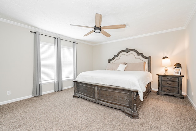 carpeted bedroom featuring crown molding and ceiling fan