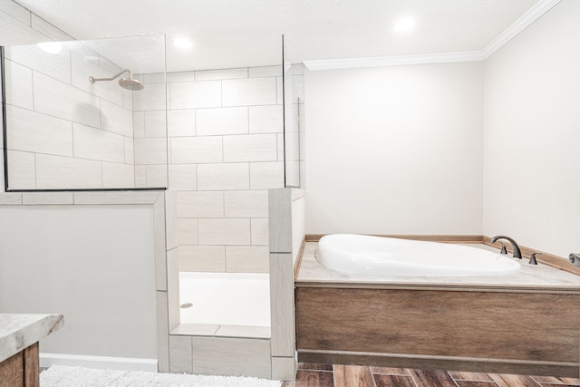 bathroom featuring vanity, crown molding, separate shower and tub, and hardwood / wood-style flooring