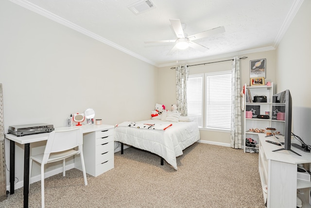 bedroom featuring ornamental molding, light colored carpet, and ceiling fan