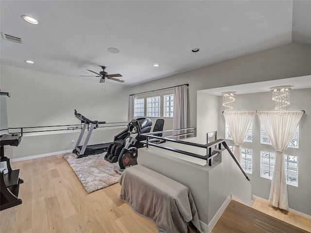 workout area with wood finished floors, visible vents, baseboards, recessed lighting, and ceiling fan