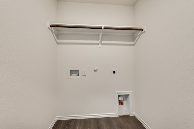 laundry area with hookup for a gas dryer, electric dryer hookup, hookup for a washing machine, and dark wood-type flooring