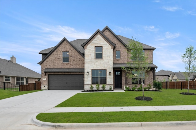 craftsman inspired home featuring fence, a front lawn, driveway, brick siding, and a garage
