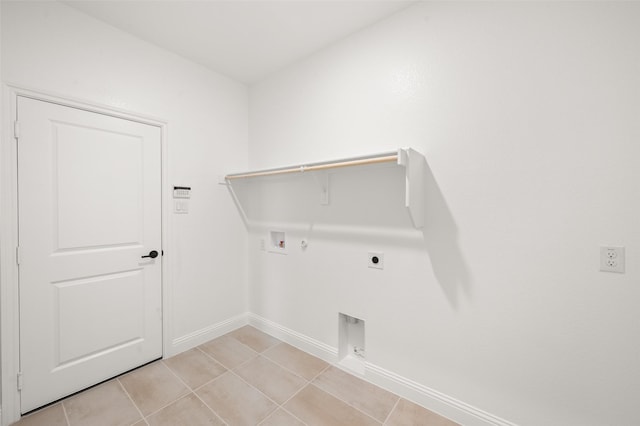 washroom featuring hookup for an electric dryer, baseboards, hookup for a washing machine, hookup for a gas dryer, and laundry area