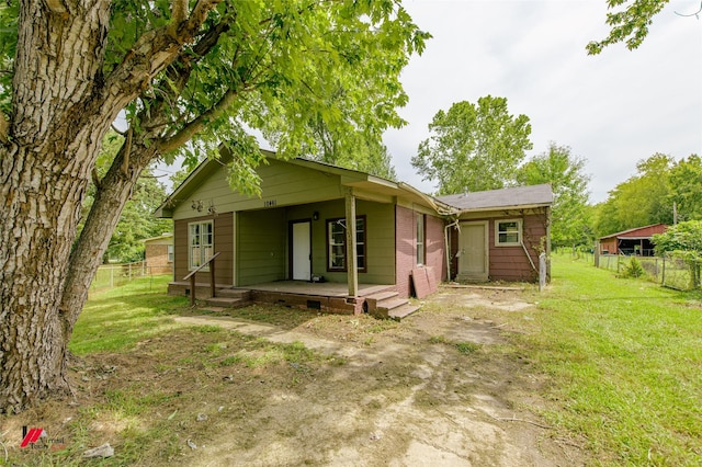 view of front of home with a front yard