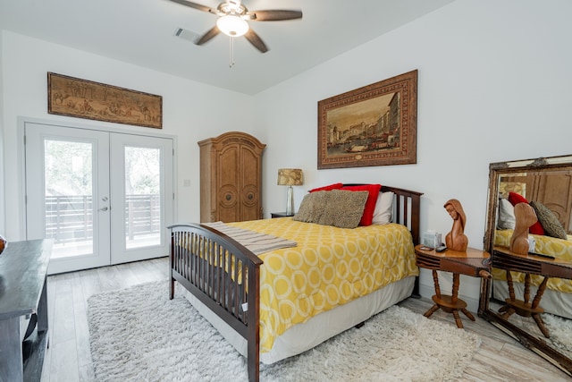 bedroom with french doors, ceiling fan, access to exterior, and light hardwood / wood-style floors