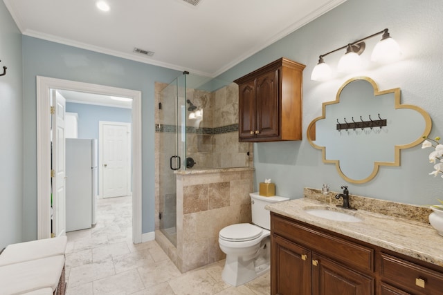 bathroom featuring vanity, crown molding, toilet, and walk in shower