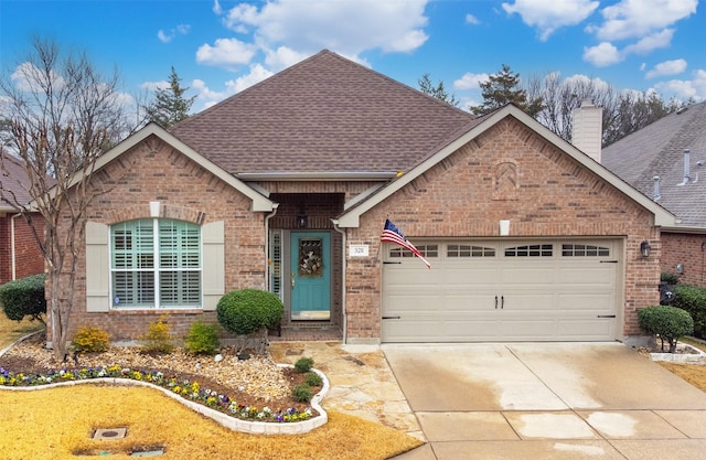 view of front of home with a garage