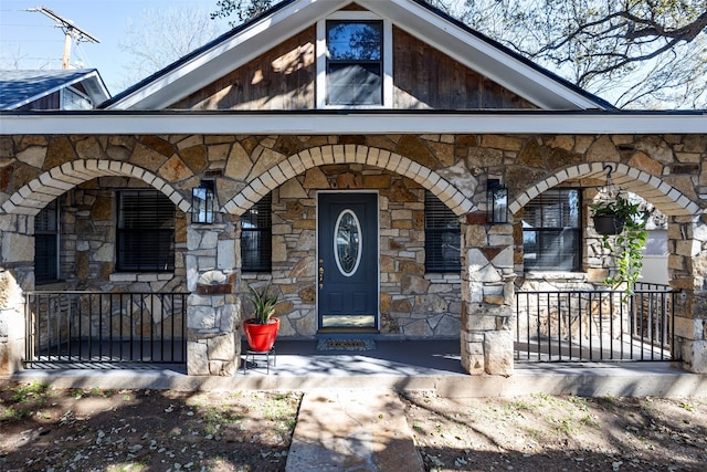 property entrance with a porch