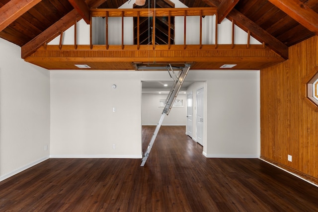 interior space featuring dark hardwood / wood-style flooring, wood ceiling, beam ceiling, and high vaulted ceiling