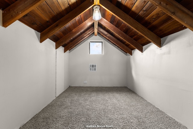 bonus room featuring carpet, vaulted ceiling with beams, and wooden ceiling