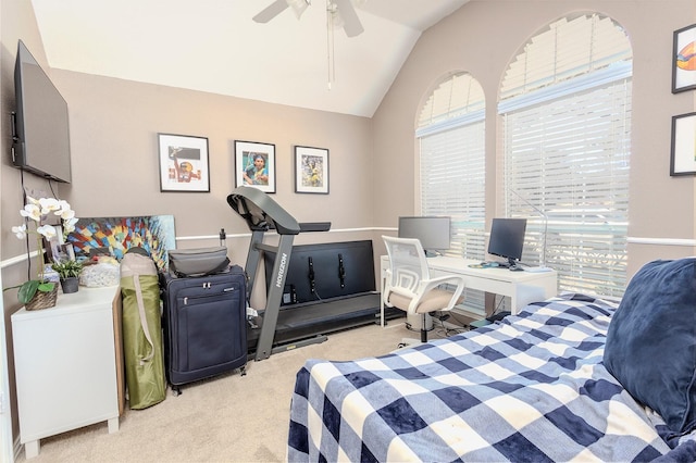 carpeted bedroom with vaulted ceiling and ceiling fan