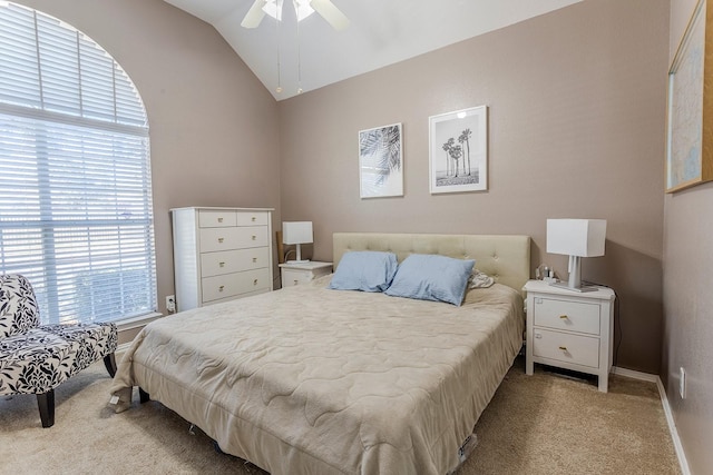 carpeted bedroom with lofted ceiling and ceiling fan