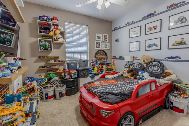 carpeted bedroom with ceiling fan