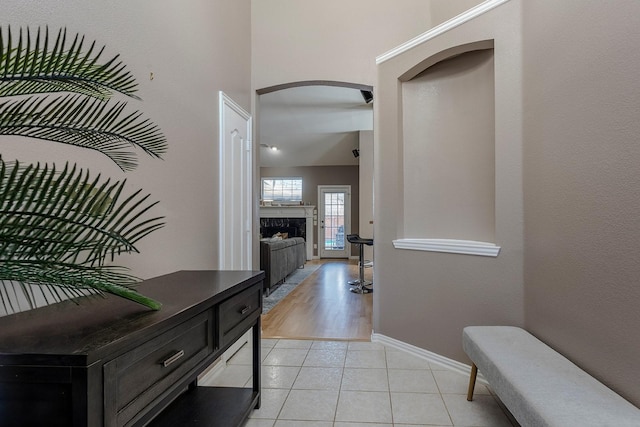 hallway featuring light tile patterned flooring