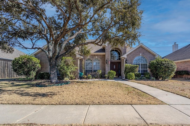 view of front of home with a front yard