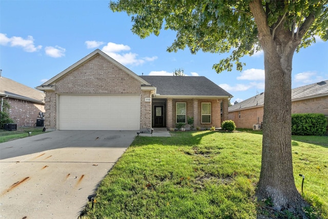 view of front of house with a garage and a front lawn