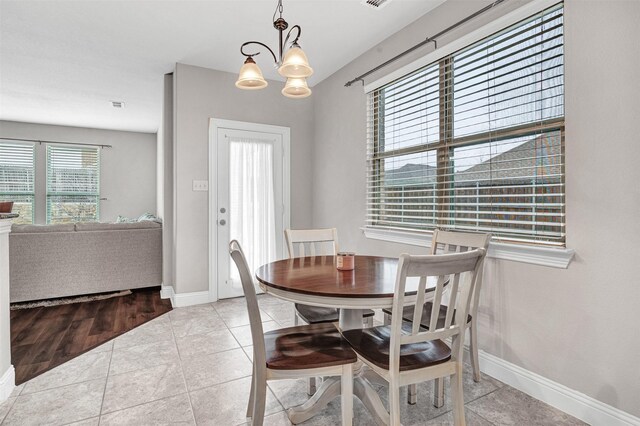 living room featuring hardwood / wood-style flooring and ceiling fan