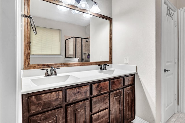 bathroom with vanity and an enclosed shower