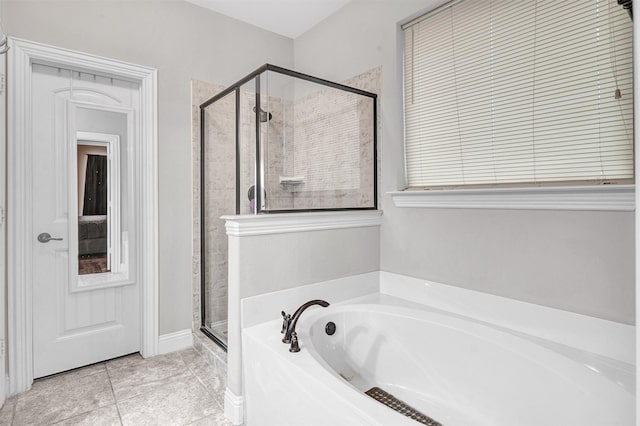 bathroom featuring tile patterned floors and plus walk in shower