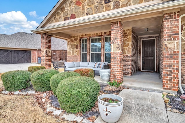 doorway to property with a garage