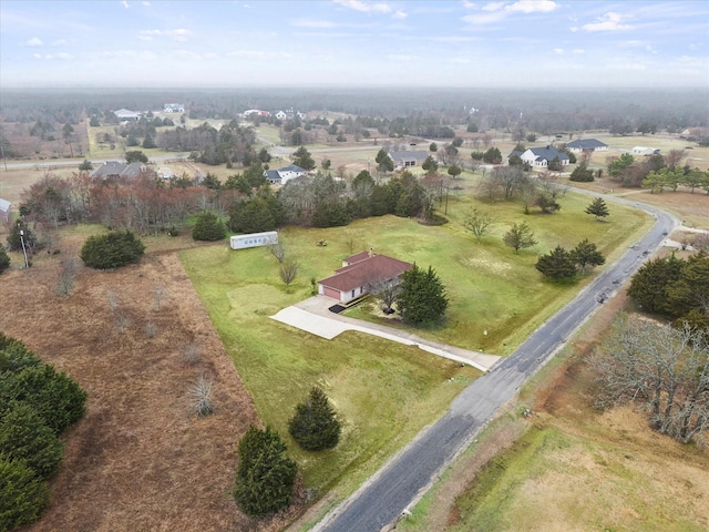 birds eye view of property featuring a rural view