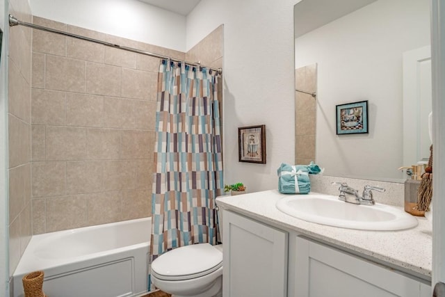 full bathroom with vanity, shower / bath combination with curtain, and toilet