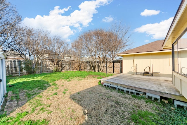 view of yard with a wooden deck