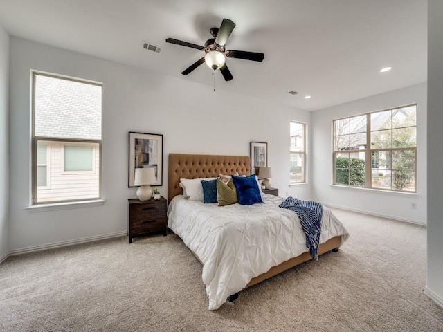 carpeted bedroom with ceiling fan