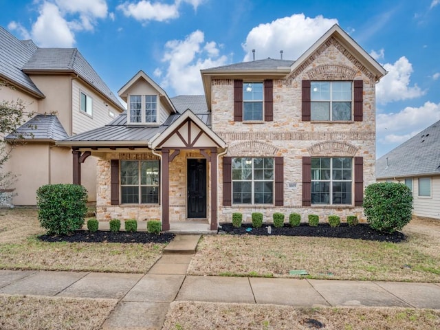 view of front of home with a front lawn