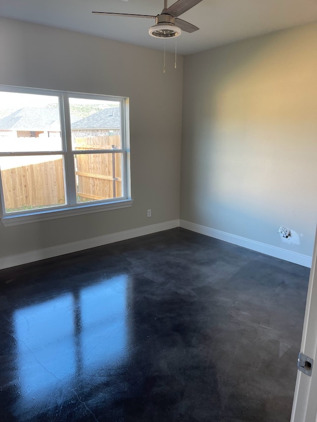 empty room featuring ceiling fan