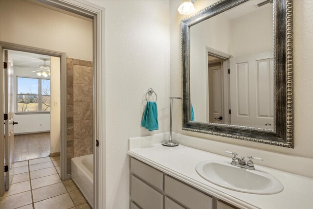 bathroom with tile patterned flooring and vanity