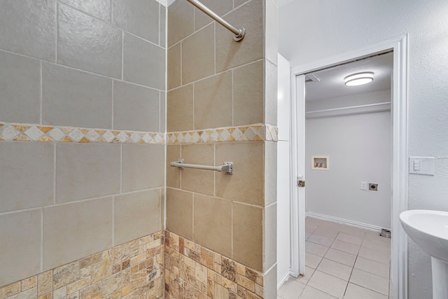 bathroom with tile patterned floors and sink