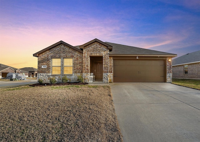 view of front of property with a garage