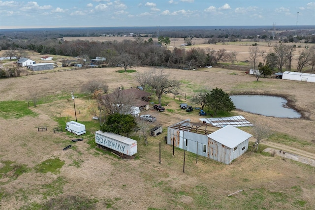 bird's eye view featuring a water view and a rural view