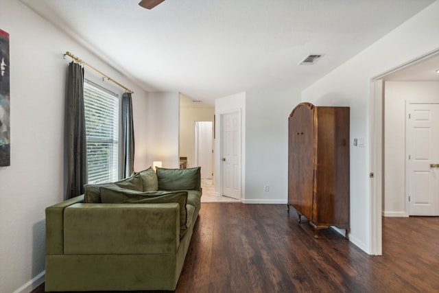 living room with dark wood-type flooring