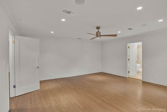 unfurnished room featuring ceiling fan, ornamental molding, and light wood-type flooring